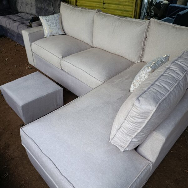 6 seater comfy L-shaped with two free throw pillows and a footrest 2